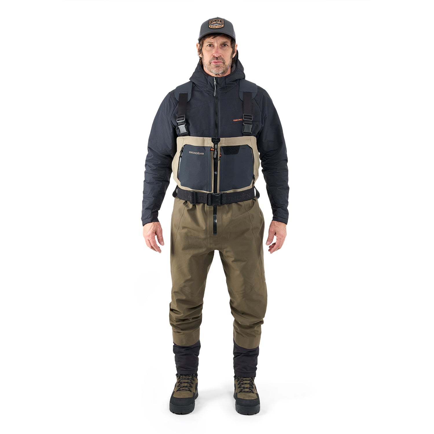 Man wearing a full-body Grunden waders and jacket on a white background