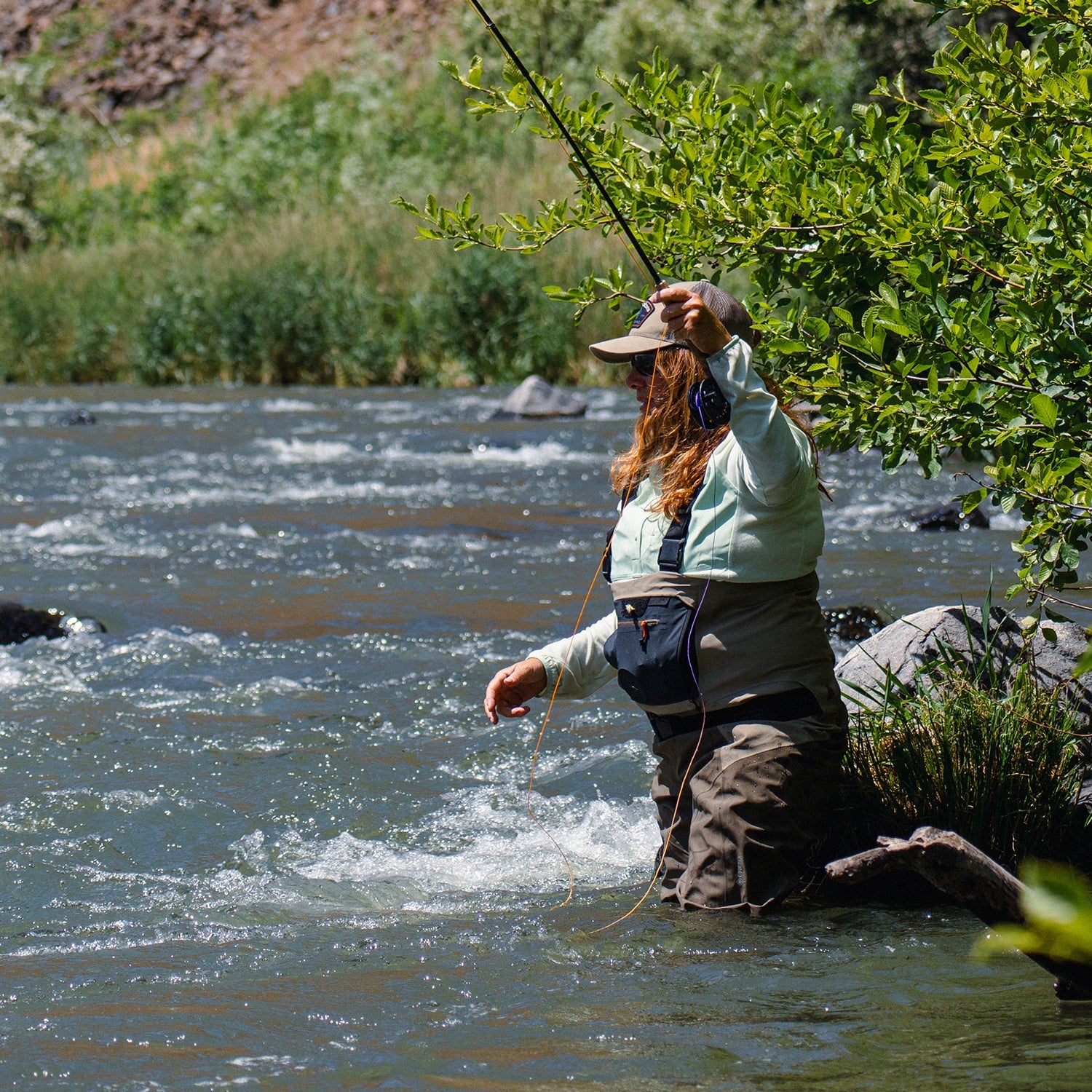 Female angler in Grundens Women's Boundary waders
