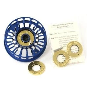 Blue and gold spey weights for fly fishing reel with additional spools and instructions on a white background